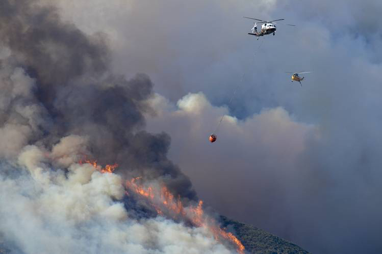 Fire crews battle the Double Spring and Ruby wildfires in Douglas County, Nevada